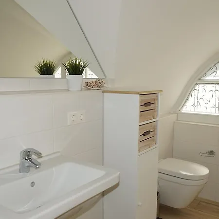 بيت للعطل Reetdach Ferienhaus Dunenblick