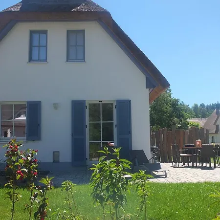 بيت للعطل Reetdach Ferienhaus Dunenblick