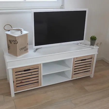 بيت للعطل Reetdach Ferienhaus Dunenblick غلوفي